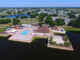 Dom na sprzedaż - 811 Lychee Drive Barefoot Bay, Usa, 102,19 m², 220 000 USD (895 400 PLN), NET-102799338