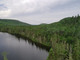 Działka na sprzedaż - 01 Ch. du Lac-d'Un-Mille, Ferland-et-Boilleau, QC J0V1H0, CA Ferland-Et-Boilleau, Kanada, 90 455 m², 140 002 USD (537 609 PLN), NET-98677108